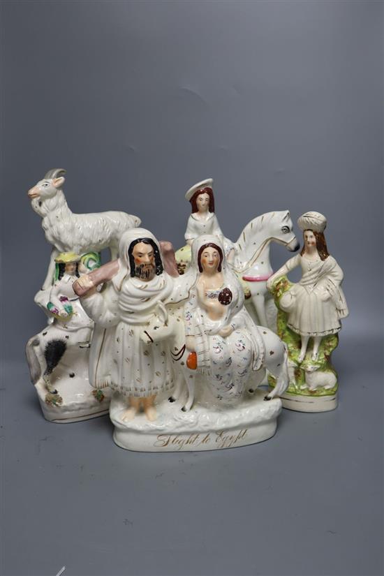 Five Staffordshire pottery groups, late 19th century, tallest 31cm